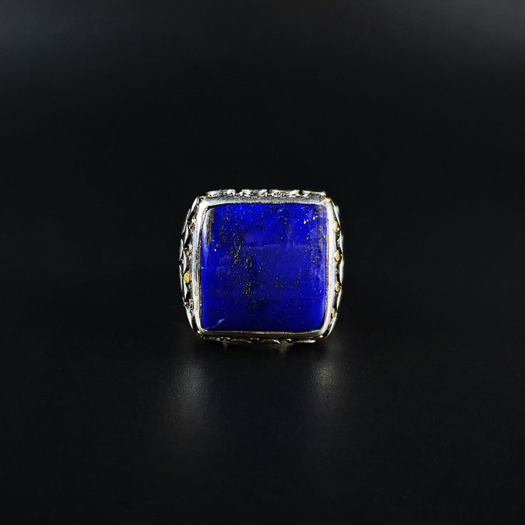 Classic and modern square cabochon blue Lapis Lazuli ring with Sterling silver. Unique gift for her or him, friend, girlfriend, wife, boyfriend, man September and December birthstone, 9 yeaar anniversary. The beautiful royal blue Lapis Lazuli is cut as a classic cabochon and set in Sterling silver with small dots of silver and 18k gold. All our stones are natural stones and our jewelry is handmade, very slight differences may occur in color and size. Our inlay work is all natural stone, NOT pres Luxury Blue Square Cut Ring, Luxury Lapis Lazuli Jewelry, Square Sterling Silver Jewelry With Polished Finish, Modern Cabochon Sapphire Ring For Gift, Luxury Square Ring As A Gift, Luxury Square Rings For Gifts, Luxury Square Jewelry For Gifts, Blue Lapis Lazuli Signet Ring With Gemstone, Blue Lapis Lazuli Gemstone Signet Ring