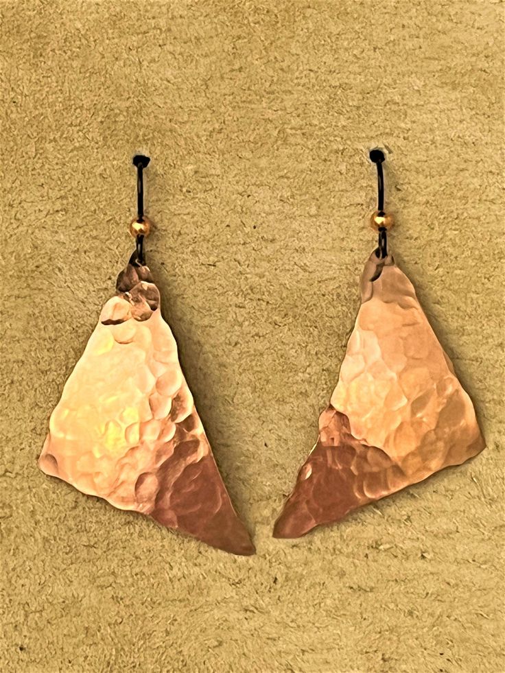 Hammered and domed copper earring, 24 ga copper so super light, hypoallergenic wire accented with copper ball. Bronze Copper Jewelry With French Hook, Artisan Copper Wire Dangle Earrings, Unique Nickel-free Copper Wire Earrings, Copper French Hook Drop Earrings, Hammered Bronze Teardrop Earrings, Bronze Hammered Teardrop Earrings, Unique Bronze Copper Wire Earrings, Adjustable Teardrop Bronze Earrings, Adjustable Artisan Copper Earrings