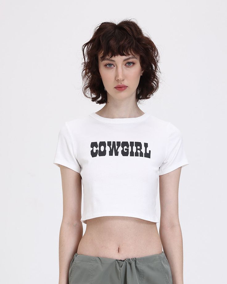 Model (WearingS):• Height: 175cm | Bust: 78cm | Waist: 57cm | Hips: 86cmDetails: Cropped T-shirt with front "Cowgirl" letter printLength: CroppedSleeve Length: Short sleevesMaterials:95% Polyester + 5% Spandex 90s Aesthetic Grunge, Vintage 90s Aesthetic, Y2k Cowgirl, Cowgirl Baby, Y2k Aesthetic Outfits, 90s Aesthetic, Y2k Outfits, Cropped T Shirt, Baby T Shirt