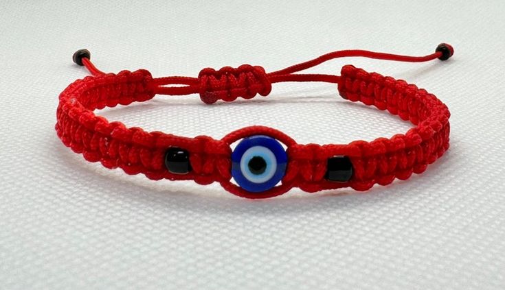 Pulsera ajustable de mal de ojo - Etsy Handmade Adjustable Festival Wristband, Handmade Adjustable Braided Bangle Bracelet, Handmade Adjustable Wristband For Festivals, Adjustable Red Bohemian Wristband, Red Adjustable Bohemian Wristband, Handmade Adjustable Red Evil Eye Bracelet, Handmade Adjustable Spiritual Evil Eye Bracelet, Handmade Adjustable Bangle Bracelet, Handmade Adjustable Bangle Wristband