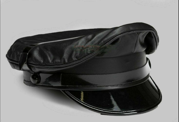 DESCRIPTION Crafted from premium soft genuine leather, this biker-inspired Muir cap boasts a solid black glossy peak and features a sleek black plastic strap for a secure fit. Elevate your next army ensemble with this impeccable accessory, perfect for commanding attention on any occasion. Whether you're gearing up for a special party or event, this handcrafted leather cap adds the perfect finishing touch to your look. Its luxurious feel and superior craftsmanship make it ideal for bikers, office Costume Capes, Military Memorabilia, Bubble Wrap Packaging, Leather Cap, Handcrafted Leather, Trucker Cap, Leather Fashion, Costume Accessories, Solid Black