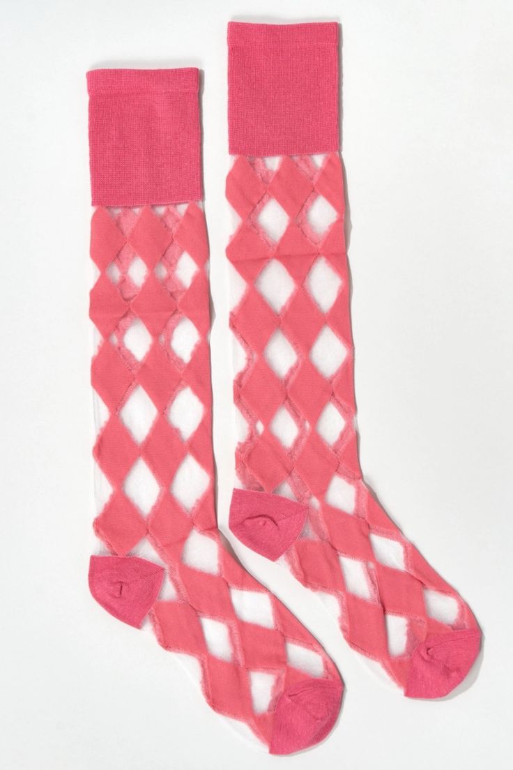 About this product - Argyle pattern - Nylon knee high socks - Made of 100% polyester - Partially sheer - One size Product by Girly Nylon Knee-high Socks, Fitted Nylon Knee-high Socks, Trendy Mesh Stockings For Spring, Sheer Fitted Nylon Socks, Fitted Fishnet Socks For Spring, Trendy Fitted Pink Knee-high Socks, Summer Knee-high Stretch Stockings, Spring Thigh-high Mesh Stockings, Spring Mesh Socks