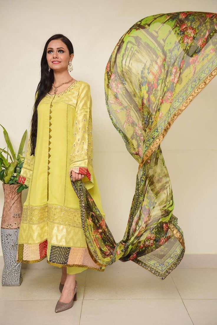 Description An alluring lime ensemble portrays an intricate design at the front and sleeves which is enhanced with pearls & beads handwork. The look is complemented with a gorgeous silk dupatta to adorned this festive season. 3 Piece Size: Medium & Large size available( Size Chart given in the pics) Color: Yellow Family  Shirt Fabric: Crinkle Chiffon  Dupatta: Silk Trouser: Rawsilk  Includes: Shirt, Inner, Trouser & Dupatta Please Note: Actual color may slightly vary from the image shown due to Unstitched Silk Dress With Intricate Embroidery, Cotton Party Dresses For Eid, Cotton Anarkali Party Dress, Elegant Semi-stitched Embroidered Dress For Party, Elegant Semi-stitched Embroidered Party Dress, Eid Dresses With Intricate Embroidery, Summer Party Wear Designer Sets, Designer Summer Party Wear Sets, Elegant Green Dress With Floral Embroidery