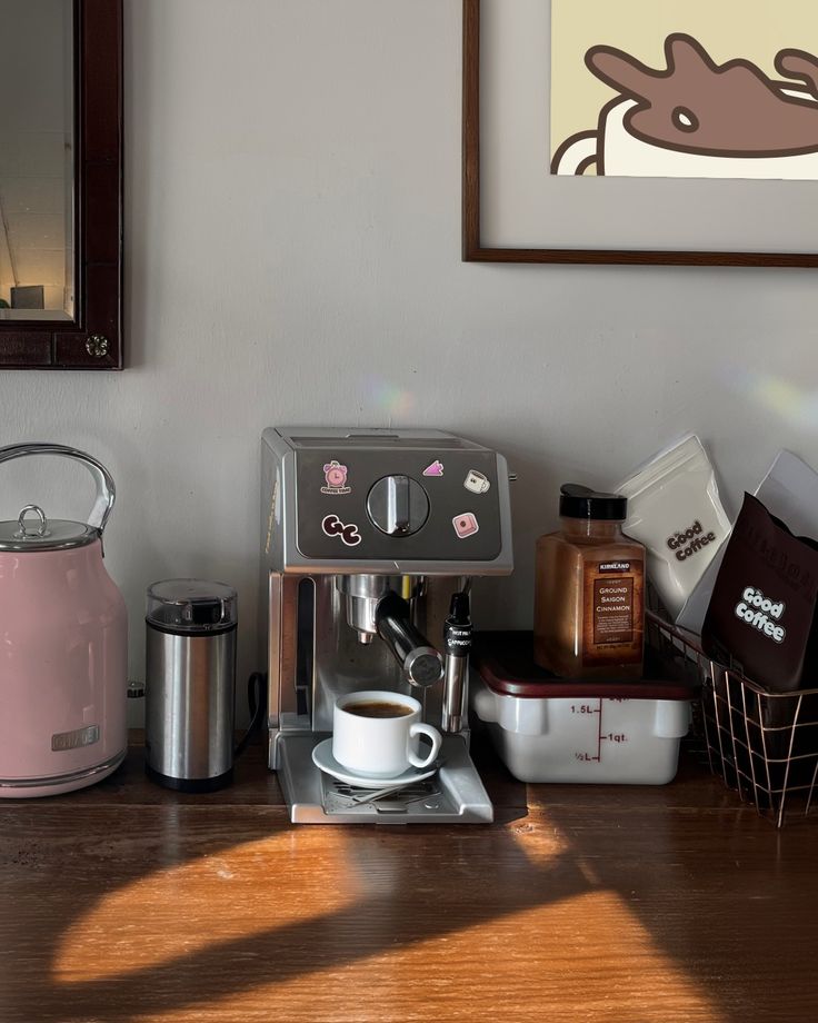 a coffee maker sitting on top of a wooden table