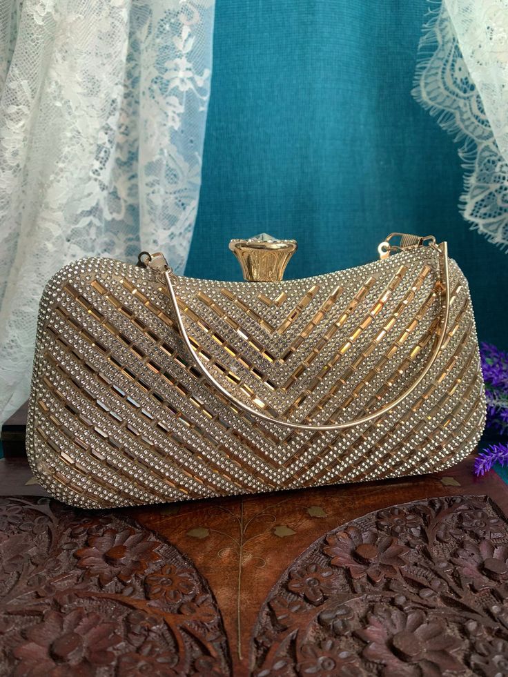 Fashion handbag / clutch . Gold plated hardwire. Crystal work. Velvet body and hand embroidery. Luxury Hand Embellished Gold Clutch, Formal Gold Hand-embellished Clutch, Gold Hand-embellished Evening Bag, Gold Embellished Crystal Clutch, Luxury Gold Hand-embellished Clutch, Clutch Handbag, Fashion Handbags, Hand Embroidery, Gold Bracelet