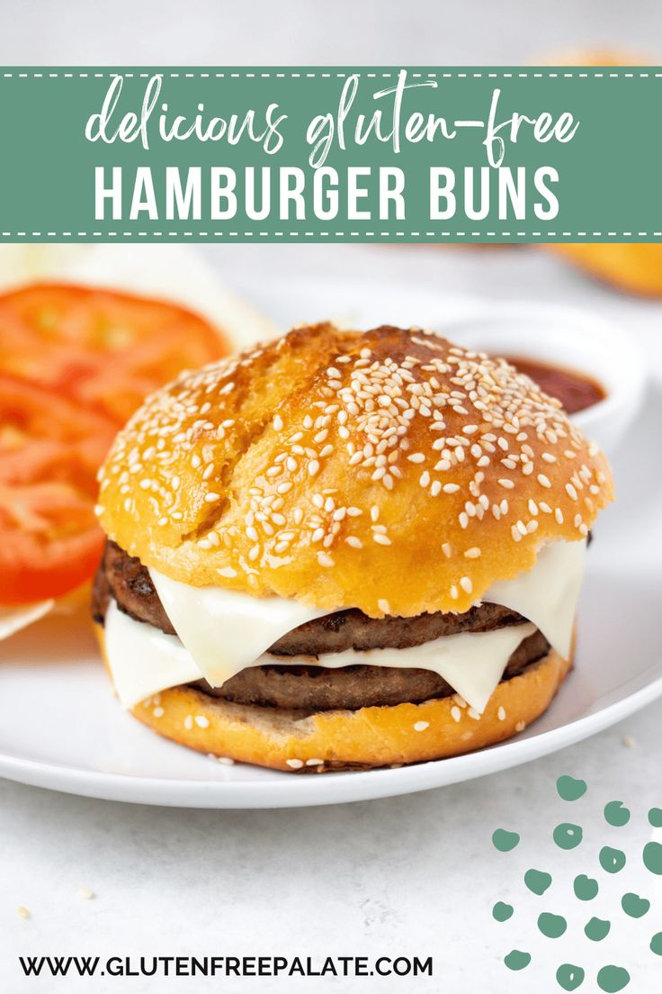 a hamburger bun on a white plate with tomatoes