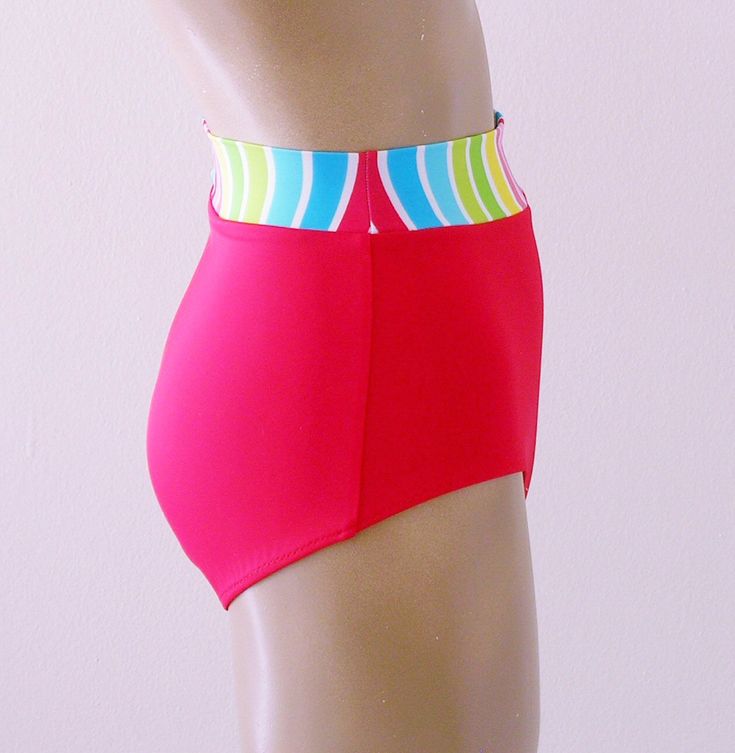 "Bandeau top hooks in back, and has boning in sides for stability. Lined with standard beige swimwear lining; no cups, pads, or wires. Retro banded full brief bottom is lined in front, and has full back coverage. Fabric is matte-finish 80% Nylon/20% Spandex. Tops and bottoms can be mixed sizes: S-M-L-XL. **SIZING RUNS SMALL, so please read the size chart before ordering. USA SIZE CHART: SMALL: Height: 5'0\"-5'4\"; Weight: 100-115 lbs.; Bust: 30-32; Waist: 22-24; Hips: 32-34 MEDIUM: Height: 5'4\" Red Swimwear With Built-in Shorts For Swimming, High Cut Beach Swimwear With Boning, High Cut Swimwear With Boning For Beach, Stretch Beach Bottoms With Boning, Red Lined Stretch Swimwear, High Cut Stretch Bottoms For Beach, High Cut Beachwear Bottoms For The Beach, High Cut Stretch Swimwear For The Beach, Stretch High Cut Swimwear For Beach