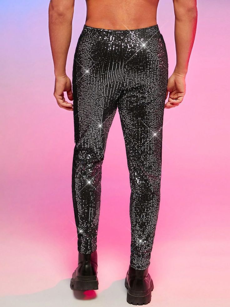 These dress pants feature a unique blend of sequined glitter fabric that adds a fashionable and stylish look to any wardrobe. They are crafted in a slim fit for an enhanced silhouette and come in a variety of colors to match any outfit. They offer a luxurious feel and give any outfit a high-end finish. 94% Polyester, 6% Elastane Imported Pull On closure Hand Wash Only Shimmer Bottoms For Party And Holiday Season, Holiday Party Shimmer Bottoms, Fitted Shiny Black Pants, Black Glitter Party Bottoms, Black Sequined Bottoms For Party, Embellished Bottoms For Evening Party Season, Embellished Bottoms For Evening Parties, Embellished Evening Bottoms For Party Season, Embellished Bottoms For Evening And Party Season