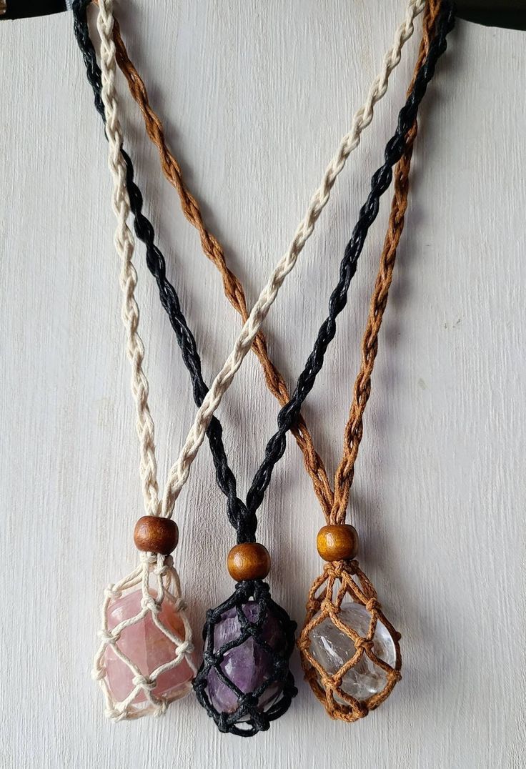 Macrame crystal pouch necklace, Amethyst necklace, Tumbled stones, These pouch are boho style, Available in 3 colors and 3 different stones, These are adjustable with a wood bead so you can wear it short or Long as desired. Size: Adjustable to 16'' - 28'' Material: White, brown and White macrame cord pouch necklace, Rose quartz, amethyst and Clear quartz tumbled stones, Wood beads. You receive ONE similar necklace like the ones in the pictures. ---Spiritual meaning: -Clear Quartz is healing and Macrame Pouch Necklace, Bohemian Adjustable Crystal Necklaces With Raw Stone, Bohemian Crystal Necklaces With Adjustable Cord For Healing, Bohemian Crystal Necklaces With Raw Stone, Bohemian Raw Stone Crystal Necklaces For Healing, Bohemian Raw Stone Crystal Necklace For Healing, Adjustable Brown Crystal Necklace For Healing, Adjustable Bohemian Necklace With Raw Stone, Bohemian Adjustable Raw Stone Necklace