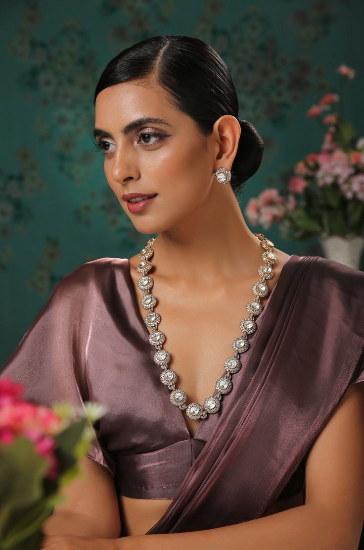 Gold plated Polki necklace set is designed and handcrafted with traditional Indian Jewelry-making techniques by artisans with elements like high-grade Polki. It's a modern version of the antique Polki and faux diamond work with a modern twist of the liking of a new-age woman. Enhance your looks with our Gold plated Polki Victorian-set and make your day memorable. This Bollywood Jewelry is inspired by Indian traditions and will be your perfect pick for wedding jewelry. Necklace Closure - Lobster Handmade Kundan Necklaces For Formal Occasions, Handmade Kundan Necklaces For Formal Events, Formal Temple Jewelry Kundan Necklace With Matching Earrings, Elegant Meenakari Pearl Necklace For Celebration, Elegant Long Meenakari Necklaces, Elegant Long Meenakari Necklace, Elegant Handmade Jewelry For Festive Season, Elegant Pearl Meenakari Necklace, Elegant Temple Necklace With Matching Earrings