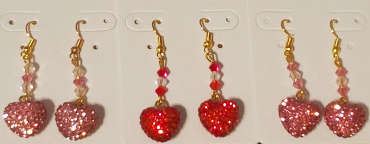 Rhinestone heart charm earrings in light pink, dark pink or red with coordinating colored crystals  Matching bracelet available Crystal Jewelry With Heart Charm For Valentine's Day, Valentine's Day Crystal Jewelry With Heart Charm, Heart Cut Charm Jewelry For Party, Party Jewelry With Heart Cut Charm, Crystal Heart Cut Jewelry With Heart Charm, Heart Cut Jewelry With Heart Charm For Party, Heart-shaped Crystal Jewelry For Valentine's Day, Valentine's Day Heart-shaped Crystal Jewelry, Round Heart Charm Jewelry For Party