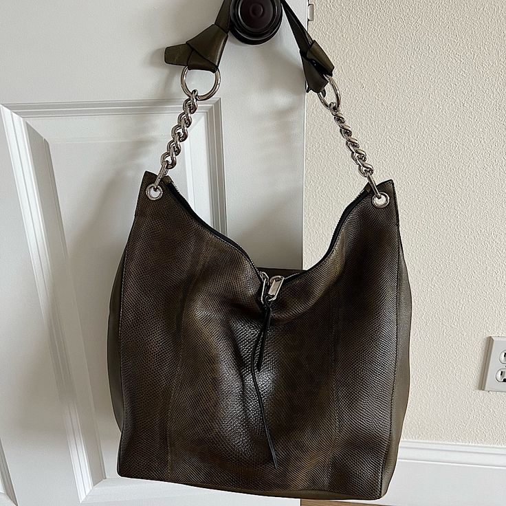 Very Good Condition Jimmy Choo Hobo Bag Original Price $2595 Minor Scratches. Very Spacious And Very Clean Inside. Snakeskin Leather Phone Pocket Double Zipper Chain Nappa Large Height - 15" Width - 14.6" Style: Hobo Handbag Handle Style: Chain Size: Medium Closure: Zipper Features: Pockets Material: Lamb Skin Side And Bottomleather/ Front And Back Snakeskin. Leather Hobo Bag With Chain Strap For Daily Use, Luxury Silver Soft Leather Shoulder Bag, Leather Hobo Bag With Chain Strap For Everyday, Everyday Silver Leather Hobo Bag, Silver Leather Hobo Bag For Everyday, Silver Textured Leather Bag, Leather Bucket Shoulder Bag With Silver-tone Hardware, Silver Leather Hobo Shoulder Bag, Rectangular Silver Leather Hobo Bag