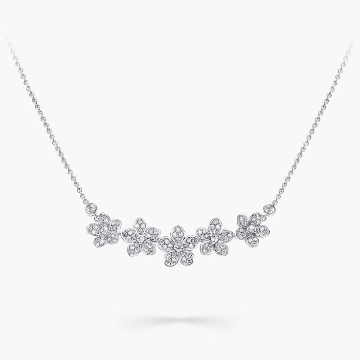 On our Wild Flower necklace, diamond flowers flourish across the collarbone in rare abundance. Unique down to every petal, the flowers blossom with a wild beauty, arranged in a delicate row. Escape into a garden that grows just for you with our Wild Flower fine jewellery collection. From trios and individual blooms to floral clusters and blossoms laid out in a row, each Wild Flower jewel is a statement of delicacy and of empowerment, designed to be worn in profusion. An expressive Wild Flower di Large Diamond Stud Earrings, Triple Diamond Ring, Diamond Shaped Engagement Ring, Large Diamond Rings, Galaxy Stuff, Flower Diamond Ring, Pave Diamond Earrings, Wild Beauty, Necklace Diamond