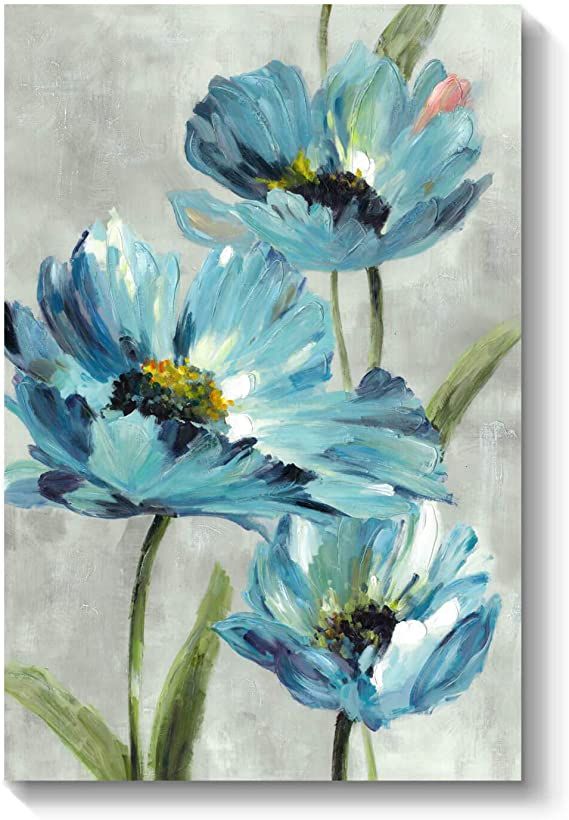 three blue flowers on a gray background