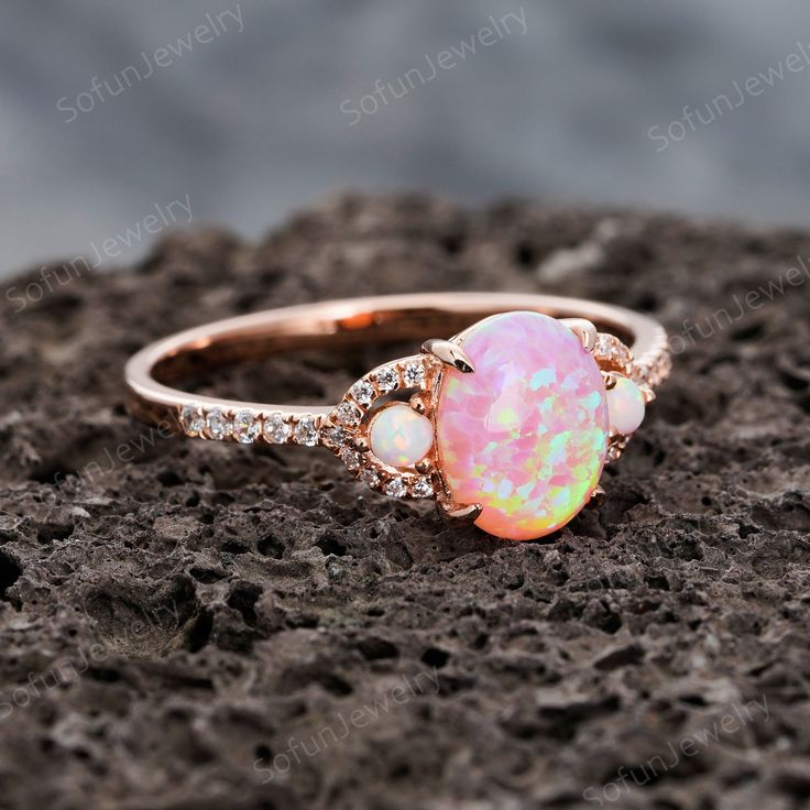 ITEM DESCRIPTION This ring is special for occasion as a gift for girlfriend and wife as anniversary gift, birthday gift, souvenir present. *Material: Sterling Silver 925 with Rose Gold Plated *Shank width: approx 1.5mm(bottom) *Center Stone: 0.8 Carat, 8X6mm Oval Cut Pink Fire Lab Opal *Accent Stone: Cubic Zircon *Prong Setting The stones of the ring can be replace with other different kinds of gemstone such as aquamarine, amethyst, citrine, white CZ, lab ruby, Sapphire etc. If you want to custo Pink Opal Ring With Accent Stones As Gift, Rose Gold Oval Opal Ring, Rose Gold Oval Opal Gemstone Ring, Oval Rose Gold Opal Gemstone Ring, Oval Promise Ring For Valentine's Day, Rose Gold Opal Birthstone Ring As Gift, Elegant Pink Opal Ring For Anniversary, Rose Gold Opal Birthstone Ring For Gift, Oval Rose Gold Opal Ring Gift