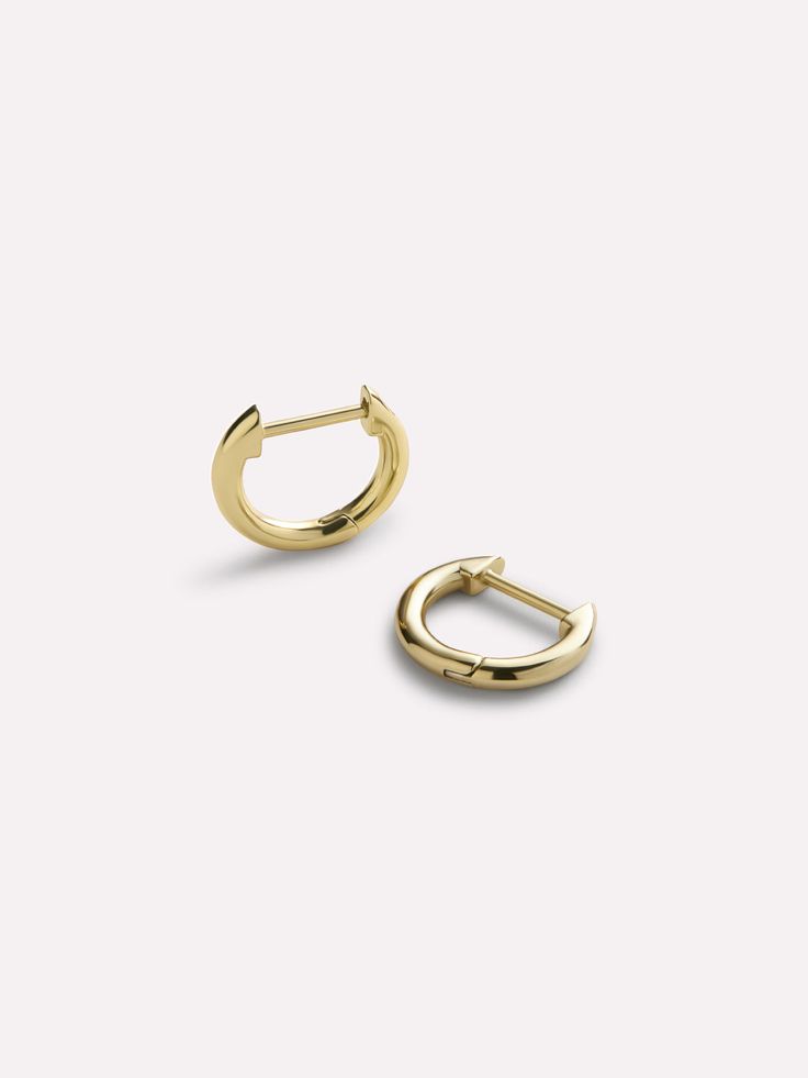 Sterling Silver - Mini Huggie Hoops Gold Huggie Earrings For Everyday, Everyday Hypoallergenic Huggie Earrings, Everyday Gold Huggie Earrings, Everyday 14k Gold Huggie Earrings, Everyday Single Huggie Earring, Everyday Huggie Hoop Earrings, Adjustable Huggie Hoop Earrings For Everyday, Simple Adjustable Huggie Earrings For Everyday, Silver Huggies