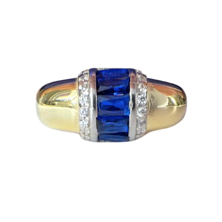 Introducing our Sapphire Crystal Gold Plated Silver Ring, a true embodiment of elegance and beauty. This exquisite ring features a stunning sapphire crystal set in luxurious gold-plated silver. The timeless design showcases the deep, captivating blue of the sapphire, making it a standout piece in any jewelry collection. Perfect for adding a touch of sophistication to any outfit, this ring is ideal for special occasions or everyday wear. Elevate your style with the refined elegance of our Sapphire Crystal Gold Plated Silver Ring. To ensure your Sapphire Crystal Gold Plated Silver Ring remains beautiful, follow these care instructions:  1. Avoid Harsh Chemicals: Keep your ring away from perfumes, lotions, and household cleaners to prevent damage to the gold plating and sapphire crystal. 2. R Timeless Hallmarked Sapphire Ring, Formal Gold Ring With Blue Topaz, Luxury Gold Rings With Blue Topaz, Gold Rings With Blue Topaz For Formal Events, Formal Gold Rings With Blue Topaz, Gold Rings With Blue Topaz For Formal Occasions, Classic Gold Topaz Ring With Diamond Accents, Luxury Blue Rings With Channel Set, Luxury Yellow Gold Sapphire Ring Channel Set