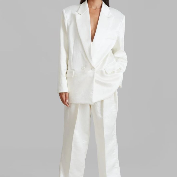 Nwt The Frankie Shop Elvira Blazer & Pleated Trousers In Ivory Large - Blazer In Medium/Large, Trousers In Large. Oversized Fit. Color Is In Ivory - An Off White With Hints Of Cream. Classic Satin Sheen Suiting Fabric, Relaxed Silhouette, Peak Lapels, Padded Shoulders, Single Breast Pocket, Front Flap Pockets, Single Front Button Closure, Lined, 100% Polyester, Dry Clean, Imported. Large Oversized Fit. Preppy, Glam, Chic. Academia. Minimalistic Chic. Trouser Pants Have Straight Leg, Front Pleate White Silk Blazer For Workwear, White Silk Blazer For Work, White Silk Blazer For Wedding, White Silk Wedding Blazer, Elegant White Silk Outerwear, Elegant Off-white Workwear Blazer, Elegant Off-white Blazer For Work, Elegant Off White Blazer For Work, Tailored White Silk Suit