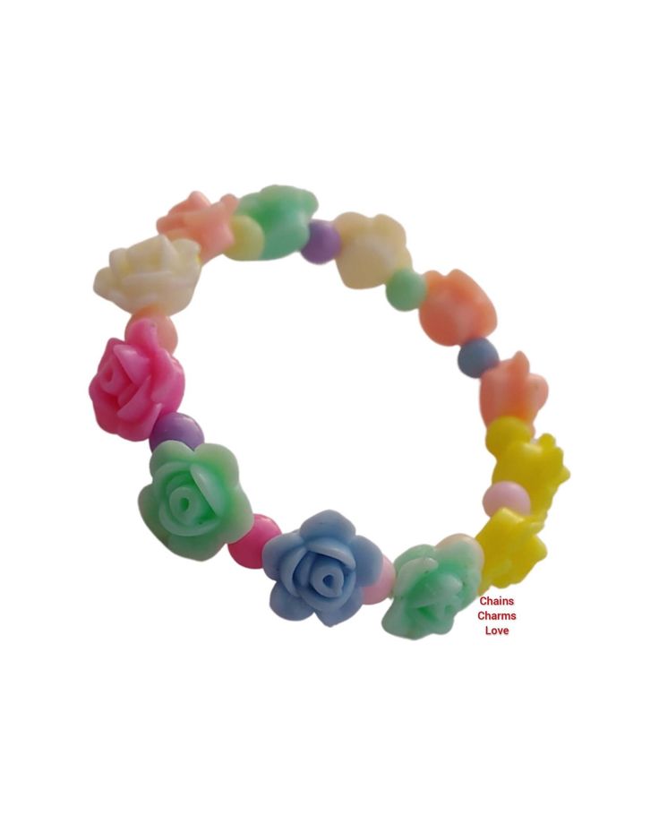 This adorable flower bracelet is perfect for little girls. Made with resin beads, stretchable cord, and fits girls wrist size 4 to 8 years old. Bracelet color may vary. Bracelet is 5.5 inches round stretch. Cute Plastic Stretch Bracelet As Gift, Cute Plastic Stretch Bracelet Gift, Cute Flower Stretch Bracelet For Gift, Cute Plastic Bracelets For Birthday, Playful Flower Beaded Bracelets For Gifts, Cute Flower Bracelets For Friendship, Playful Flower Beaded Bracelets As Gift, Playful Flower-shaped Beaded Bracelets For Gifts, Cute Flower-shaped Friendship Bracelets