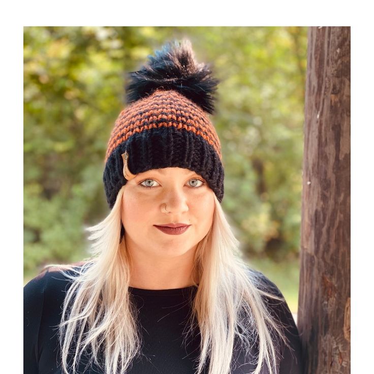 "I just love Fall, its the perfect time of year. Orange, yellow and reds leaves all over, the cold hits and you get to put on your favorite beanies! This one is one of them. Halloween themed wool beanie. Its the perfect touch for Fall. >>PLEASE READ<< COLORS → Black brim with orange and black stripes FUR POM COLOR → Shown in Black Fur Pom or can choose Black Yarn Pom >>SIZES << Newborn→ 13\" 3 Month → 16\" 6 Month → 17\" 12 Month → 18\" 2 Years Old → 19\" 3-5 Years Old → Warm Bonnet For Fall, One Size Fits Most, Adjustable Warm Bonnet For Fall, Warm Fall Hats One Size, Warm Bonnet For Fall, Adjustable Bonnet For Cold Weather In Fall, Fitted Knitted Hat For Fall, Fitted Knitted Fall Hats, One Size Beanie For Fall, One Size Fall Beanie Hat