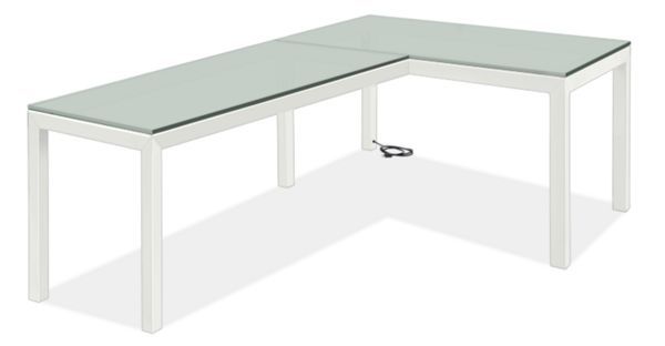 an l - shaped desk with glass top and white frame, viewed from the front