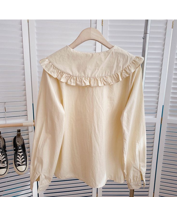 Cream Solid Color Top For Spring, Beige Solid Color Top For Day Out, Beige Solid Color Blouse For Spring, Casual Long Sleeve Apricot Blouse, Long Sleeve Cream Cotton Blouse, Trendy Beige Blouse For Day Out, Cute Cream Long Sleeve Blouse, Cute Cream Cotton Blouse, Cute Long Sleeve Beige Blouse