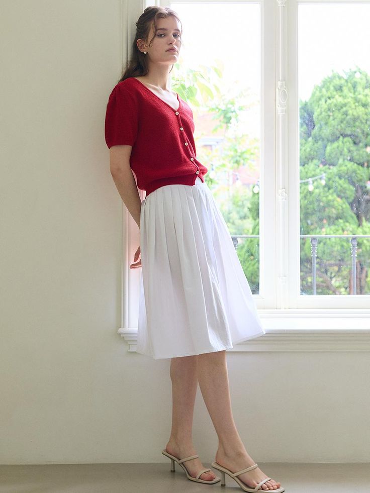 The Summer Gather Skirt is a versatile and chic addition to any wardrobe, perfect for warm weather. This product features a gathered design that creates a flattering and comfortable fit. It offers a classic silhouette that can be easily dressed up or down. - This Summer Gather Skirt is designed with a gathered waist for a comfortable and flattering fit.- The skirt offers a classic silhouette that pairs well with various tops and accessories.- It is made from lightweight fabric, making it ideal for warm weather.- A handmade Cali medal decoration has been attached to the lower right side of the front panel to add a unique point of interest. Gather Skirt, Summer Gathering, Fabric Making, Skirt White, Gathered Skirt, V Neck Cardigan, Classic Silhouette, White Skirts, Right Side