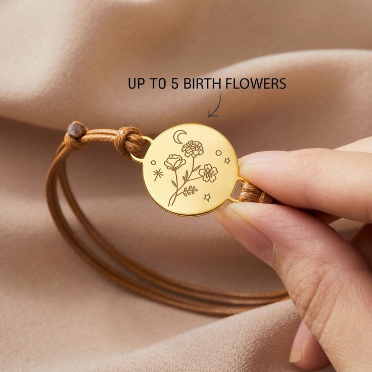 ♥ Combined Birth Month Flowers Bracelet ♥ Designed as a family bracelet, the flowers on the disc share the same roots and grow together. This bracelet can be personalized with up to 5 flowers to reflect the birth month of family members. P R O D U C T ∙ I N F O * Material: Solid 925 Sterling Silver  * Finishing: Silver - Yellow Gold - Rose Gold  * Up to 5 birth flowers * Dimension: the charm measures approx 3/4'' (19.5mm) * By default, silver items come with BLACK engraving and gold-plated item Minimalist Bracelets With Flower Charm As Gift, Personalized Flower Bracelets For Mother's Day, Personalized Flower Jewelry For Friendship, Personalized Flower Shaped Friendship Jewelry, Personalized Flower-shaped Jewelry For Friendship, Personalized Flower-shaped Friendship Jewelry, Birth Flower Bracelets For Birthday And Mother's Day, Adjustable Birth Flower Bracelet For Birthday, Adjustable Flower Bracelets For Mother's Day