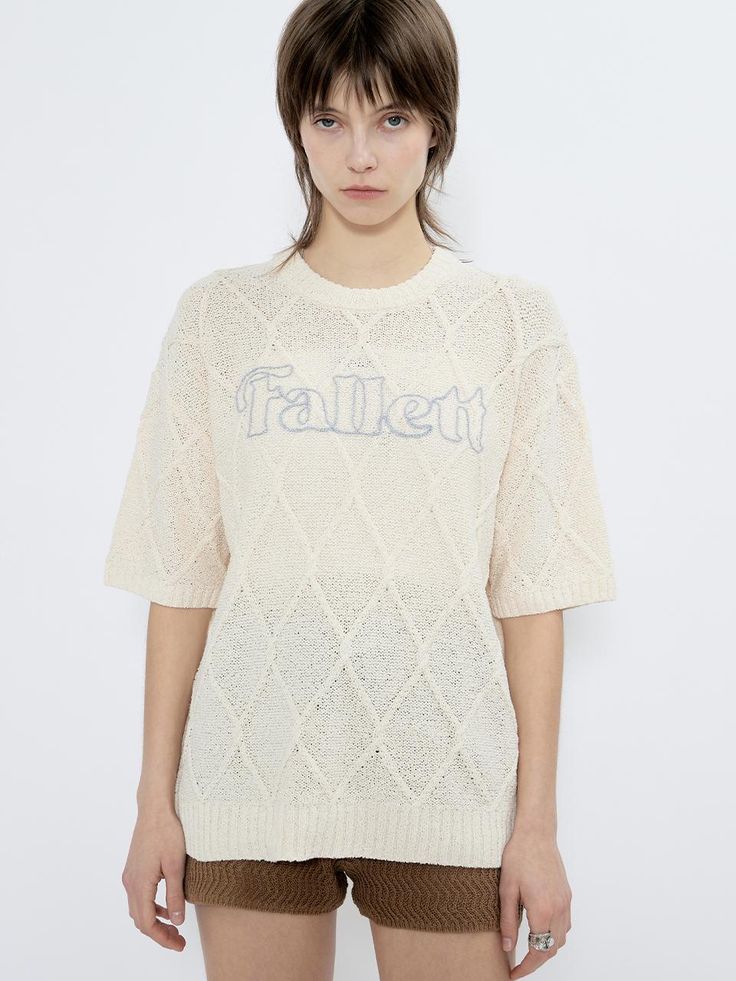 This is a trendy and unique top by FALLETT that is made out of high quality and sturdy material. With distinctive mood of the design and comfortable wear, you can style it for your casual and young daily outfit.- Relaxed loose silhouette- Logo embroidery on the front- Young and unique mood Casual Pointelle Knit T-shirt For Spring, Casual Crew Neck T-shirt With Knit Fabrication, Casual Pointelle Knit T-shirt For Summer, Oversized Cotton Knit Top With Short Sleeves, Trendy Short Sleeve Knit Top For Loungewear, Oversized Knit Tops With Letter Print, Oversized Cotton Short Sleeve Knit Top, Oversized Crew Neck Summer Sweater, Summer Relaxed Fit Crew Neck Sweater