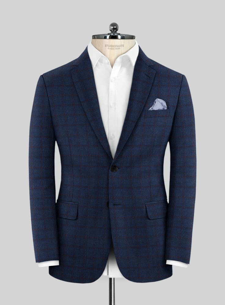 Elevate your formal style and feel comfortable in the Italian Ermene Blue Wool Jacket, which exudes class and fashion. Crafted from pure merino wool, it maintains a sharp sense of style while adding a touch of traditional elegance. Additionally, the modern blend of blue plaids makes it a versatile choice for any occasion. Enhance your wardrobe with this chic outfit that is sure to leave a lasting impression. 
 
 Look features a 2 button jacket with notch lapels, horn royal black buttons, single Semi-formal Long Sleeve Wool Tweed Jacket, Elegant Wool Outerwear Custom Fit, Luxury Custom Fit Wool Blazer, Tailored Long Sleeve Sport Coat For Semi-formal Occasions, Luxury Long Sleeve Tweed Jacket For Business, Elegant Fall Sport Coat With Custom Fit, Formal Wool Outerwear With Custom Fit, Bespoke Tailored Long Sleeve Sport Coat, Custom Fit Wool Outerwear For Formal Occasions