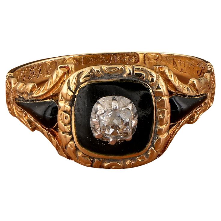 An antique Georgian period Diamond and Black enamel mourning ring in 18 Kt yellow gold, set with an old cut Diamond in a border of black enamel, the engraved shoulders decorated with further enamels With a glass covered locket compartment on the reverse 1 old mine cut diamond of approx .20 Ct Band inscribed 'Thomas Cook OB 13 oct 1824 AET 34', full British hallmarks for London 1824 Wonderful general condition Cannot be altered in size Unless otherwise stated boxes are for presentation only Furth Black Enamel Ring, Enamel Locket, Georgian Jewelry, Old Mine Cut Diamond, Enamels, Gold Set, Cluster Ring, Black Enamel, Signet Ring