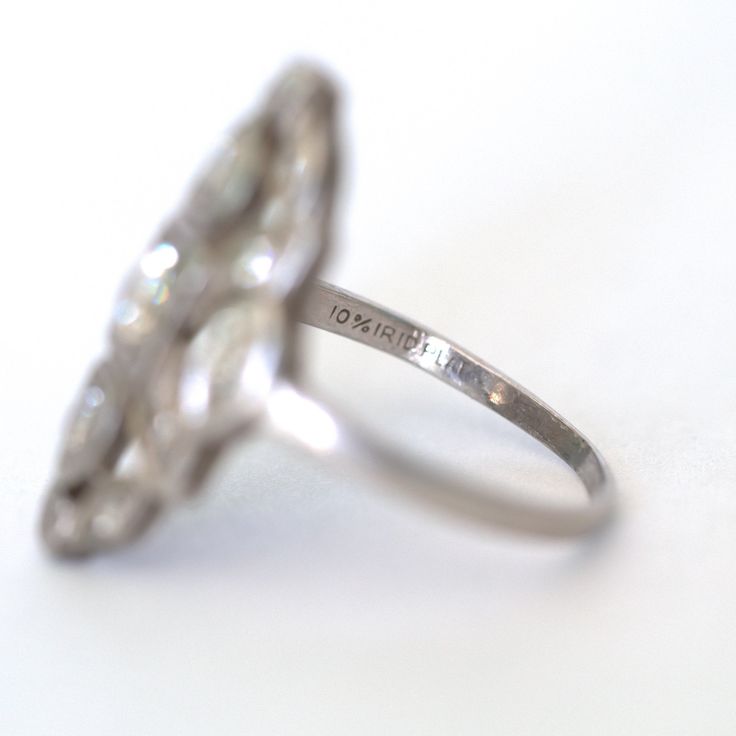 This ring can be sized up or down 4 sizes for an additional $30. If you wish to have a ring sized please purchase the item and note the size in the message section. Ring Size: 5.75 Metal Type: Platinum [Hallmarked, and Tested] Weight: 4.6 grams Diamond Details: Weight: .50ct, total weight Cut: Old European Brilliant Color: G-H Clarity: VS Finger to Top of Stone Measurement: 3mm Condition: Excellent Payment & Refund Details: *More Pictures Available on Request* Payment via Visa/Mastercard/Dis Collectible Platinum Diamond Ring In Diamond White, Collectible Diamond White Platinum Diamond Ring, Platinum Collectible Diamond Ring, Platinum Diamond Ring With Diamond Cut For Collectibles, Vintage Signet Ring With Diamond Accents, Art Deco White Gold Halo Ring, White Gold Art Deco Halo Ring, Collectible Platinum Diamond Ring With Brilliant Cut, Collectible Platinum Rings With Brilliant Cut