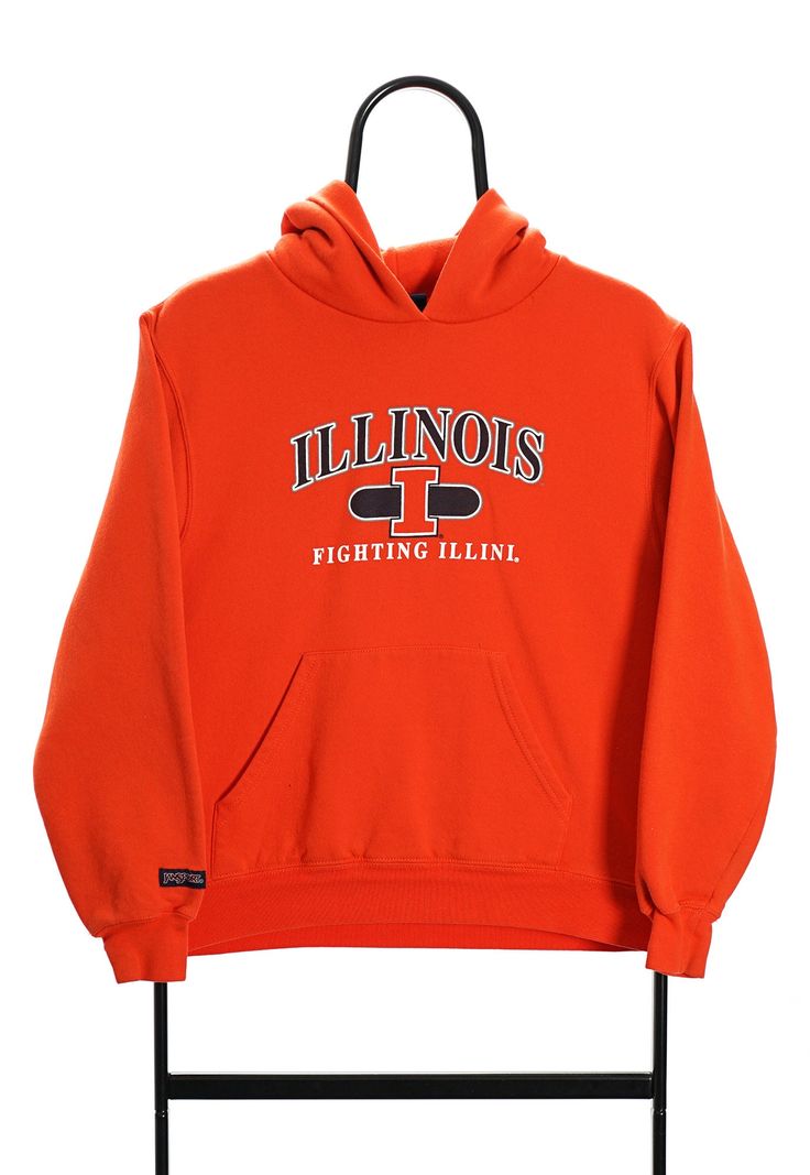 Orange hoodie with Illinois Fighting Illini logo. Good condition. Size (Approx. in: cm: Pit to Pit: 48, Length: 54 Sports Hoodie With Logo Print For Fall, Sporty Hoodie With Logo For Fall, Sporty Fall Hoodie With Logo, Sporty Logo Sweatshirt For Winter, Sporty Fleece Hoodie With Logo Print, Sporty Long Sleeve Hoodie With Logo, Crew Neck Hoodie With Logo For Winter, Sportswear Hoodie With Logo Print, Team-colored Long Sleeve Hoodie For Streetwear