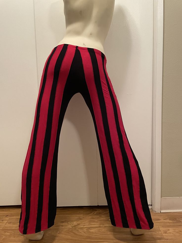 Edgy Stretch Pants For Halloween, Punk High-waisted Halloween Bottoms, Black Retro Fall Pants, Halloween Wide Leg Stretch Bottoms, High Waist Black Halloween Bottoms, Punk Style Stretch Bottoms For Cosplay, Halloween Stretch Wide Leg Bottoms, Halloween High Waist Stretch Pants, Alternative High Waist Pants For Halloween