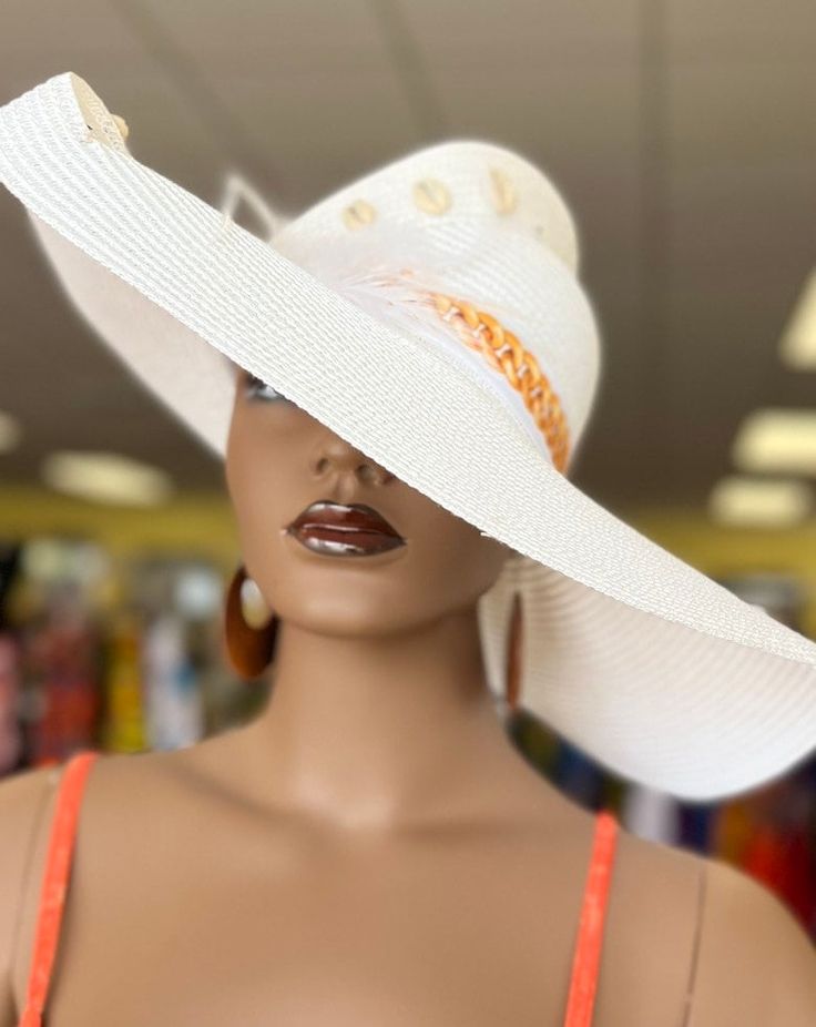 This is a Spring or Summer Sassy dress hat is everything.This beautiful dress hat makes a statement!Great for many indoor or outdoor occasions. The shade of color is fantastic can be with many outfits.Make this part of your unique hat collection.Brim 6 inches, in depth 4 inches and circumference 22 inches.Don't delay order yours today! Elegant Fitted Hat Bands For Vacation, Elegant White Adjustable Panama Hat, White Elegant Panama Hat, Fitted White Panama Hat For Beach, Chic White Hat Bands For Kentucky Derby, Adjustable High Crown Sun Hat For Vacation, High Crown Straw Hat For Summer Vacation, White Fitted Panama Hat For Beach, White Fitted Fedora Straw Hat