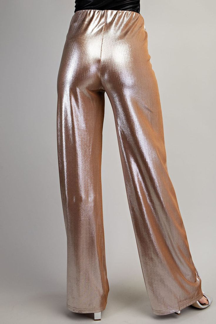 Indulge in glamour with our Out For Drinks Pants! These Metallic Wide Leg Knit Pants feature an elastic waist band in a luxurious gold color. Perfect for a night out, these pants will elevate your look and keep you comfortable all evening long. Add a touch of shine and style to any occasion with these must-have pants. 35" inch inseam. High Waist Stretch Shiny Pants, Stretch Shiny High Waist Pants, Shiny Stretch Bottoms For Fall, Fall Shiny Stretch Bottoms, Glamorous Wide Leg Pants For Night Out In Fall, Party Pants In Metallic Color With Sheen, Metallic Party Pants With Sheen, Metallic Sheen Pants For Party, Elegant Stretch Wide Leg Pants For Party