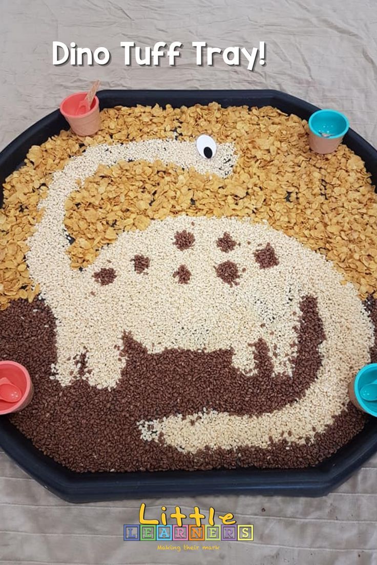 a cake made to look like a cow with lots of oats on it's face