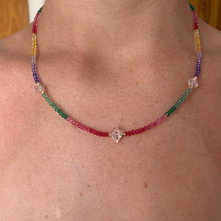 3 small Herkimer Diamond points strung on Rainbow Quartz Gemstone Necklace. The multi color ombre quartz stones sparkle in shades of fuschia to light pink, jungle greens , purples to lilac and golden yellows. Necklace evokes a tropical vibe and is a summer must have. Necklace measures 18 inches and has an extender of 1.5 inches. The necklace is available in other gemstones. Please inquire if there is a stone you are interested in and not mentioned. Herkimer Diamonds, mined in Herkimer, NY are the most powerful energy infused crystals in the crystal world. Herkimers absorb negative energy and help us manifest our intentions. Limited quantity available. Adjustable Rainbow Crystal Necklace With Faceted Beads, Multicolor Adjustable Dainty Crystal Necklaces, Multicolor Adjustable Dainty Crystal Necklace, Adjustable Multicolor Dainty Crystal Necklaces, Adjustable Multicolor Crystal Necklace, Dainty Multicolor Gemstone Beads Crystal Necklace, Adjustable Rainbow Faceted Beads Necklace, Dainty Handmade Multicolor Crystal Necklaces, Handmade Dainty Multicolor Crystal Necklace