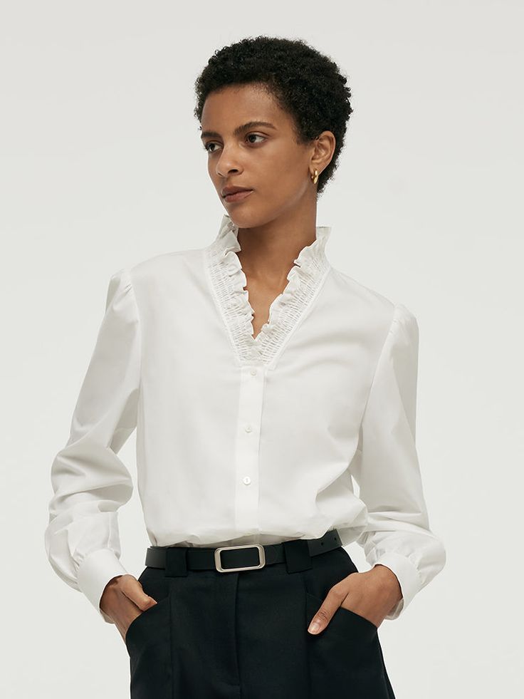 -Cotton -V-neck -Skin-friendly Designed with a romantic ruffled V-neckline, this white shirt adds a vintage-inspired piece to your closet. Crafted from a lightweight and comfortable fabric, it ensures all-day wear whether at the office or on a casual outing. Easily paired with formal or casual bottoms. Perfect for those women who love vintage style.Ruffle Collared V-Neck Women ShirtGoodsNo: 1C9L3E230• Fit Type: Fit• Elastic: Micro-elastic• Thickness: ModerateMaterialsShell:63%Cotton32%Polyester5 Formal Shirts Women, Modern Cheongsam, Neck Women, Casual Bottoms, Long Sleeve Short Dress, Silk Jacket, Love Vintage, Ruffle Collar, Women Shirt