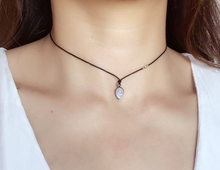 "Stylish and effortless 0.5mm black leather cord Necklace with moonstone or seaglass pendant . It is very comfortable and stand out! If this is too dainty for you please check out the thicker and bigger version: https://www.etsy.com/listing/536000591/dark-brown-leather-cord-lace-knocked?ref=shop_home_active_9 Or the match bracelet: https://www.etsy.com/listing/543430942/leather-cord-lace-knocked-with-hill?ref=shop_home_active_1 Each necklace is around 22\" and have double knot you can adjust the Moonstone Choker, Delicate Choker Necklace, Boho Choker Necklace, Black Leather Necklace, Double Knot, Cord Lace, Cord Jewelry, Boho Choker, Choker Pendant