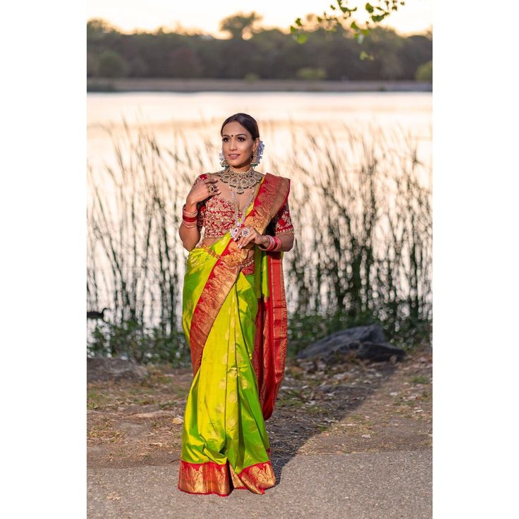 Green traditional silk saree. This piece surely looks regal and classy! Red bridal blouse sold separately! Saree comes with original blouse. Color -Green and Red Fabric & Work Style -- Silk saree. Details -- Assured quality.- Wash care instruction: Dry clean only.- Slight variation in color is possible due to digital photography. Bollywood Style Paithani Silk Lehenga With Tilla, Bollywood Style Tilla Paithani Silk Saree, Bollywood Art Silk Saree With Tilla, Bollywood Style Art Silk Saree With Tilla, Traditional Art Silk Saree With Tilla, Art Silk Blouse Piece With Tilla In Traditional Drape, Traditional Fitted Saree With Tilla Detailing, Traditional Fitted Saree With Tilla, Traditional Art Silk Saree With Tilla Embroidery