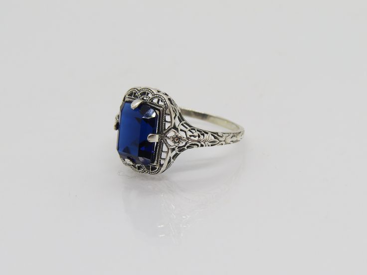 Vintage Sterling Silver Blue Sapphire Filigree Ring ....Marked 925...Total of weights 2.3grams...Size 8...Measure of Face 14.7MM...It's in very good condition. Solitaire Rings, Filigree Ring, 1980s Vintage, Silver Blue, Solitaire Ring, Vintage Sterling Silver, Sapphire Ring, Blue Sapphire, Sapphire