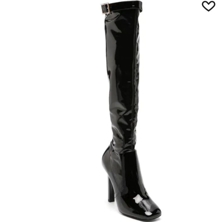 The Details Saint Laurent Elle 105mm Knee-High Boots Made In Italy Highlights Black Leather Patent Finish Panel Detailing Crystal Buckle Detail Gold-Tone Hardware Pull-On Style Square Toe Belted Opening Knee-High 105mm High Heel Composition Outer: Polyurethane 100%, Nylon 70%, Calfskin 25% Sole: Leather 100% Lining: Leather 100% Sleek Heeled Boots With Block Heel For Party, Sleek Party Heeled Boots With Block Heel, Sleek Block Heeled Boots For Party, Sleek Knee-high Heels For Night Out, Evening Patent Leather Knee-high Heels, Evening Patent Leather Knee-high Heeled Boots, Evening Patent Leather Heels, Evening Knee-high Patent Leather Heeled Boots, Knee-high Patent Leather Heels For Formal Occasions