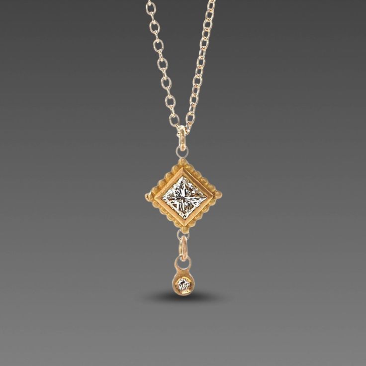 This sweet little necklace features a brilliantly sparkling square diamond, set in 22k gold and accented with a tiny diamond drop. Hangs on a delicate 14k chain. Square setting measures approximately 1/4 inch tall (from point to point). Shown at 16 inch chain length on model. Matte finish. Square Diamond Necklace, Little Necklace, Tiny Diamond, Square Diamond, Diamond Drops, Diamond Set, 22k Gold, Chain Lengths, Chain Length