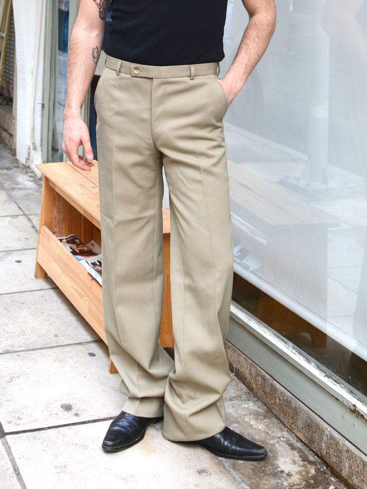 Vintage 90s trousers in dark beige color & high rise fit Made of cotton & viscose Size: W30L34 Zipper fly *VINTAGE CONDITION: 9/10 MEASUREMENTS (cm/in) - Waist perimeter: 77cm / 30in - Hips perimeter: 100cm / 39in - Inseam: 85cm / 34in - Rise: 30cm / 11.5 - Length: 110cm / 43in for more measurements if needed please contact me through etsy messages or via instagram * all clothes are categorized from 1 to 10 considered their vintage condition. 10/10 corresponds to deadstock item, 9/10 to used ite Classic Khaki Full Length Bottoms, Fitted Khaki Wide-leg Dress Pants, Classic Khaki Bottoms, Classic Full-length Khaki Pants, Classic Khaki Pants, Classic Full Length Khaki Bottoms, Khaki Wide Leg Fitted Dress Pants, Fitted Khaki Dress Pants With Wide Leg, Classic Full Length Khaki Pants