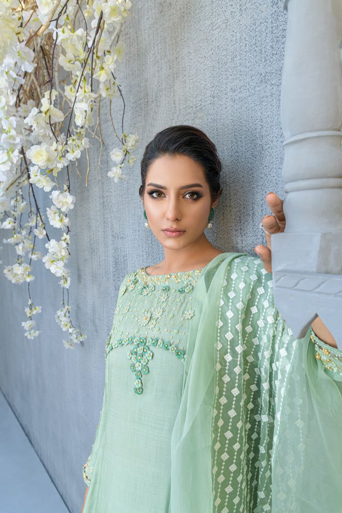 SKU: 2213 Price for Shirt, lining & Pants Ascend into the world of florals in this flowy sage green silk Kalidar ensemble glided with handwork floral details, crystal, pearls, and sequence paired with an organza dupatta with lavished laces. The border tucked with resham embroidery and florals gives this ensemble a classic look. Dupatta as is can be added. Pakistani Designer Dress, Resham Embroidery, Effortless Beauty, Eid Collection, Organza Dupatta, Pakistani Dress Design, Pakistani Designers, Pakistani Actress, Designer Dress