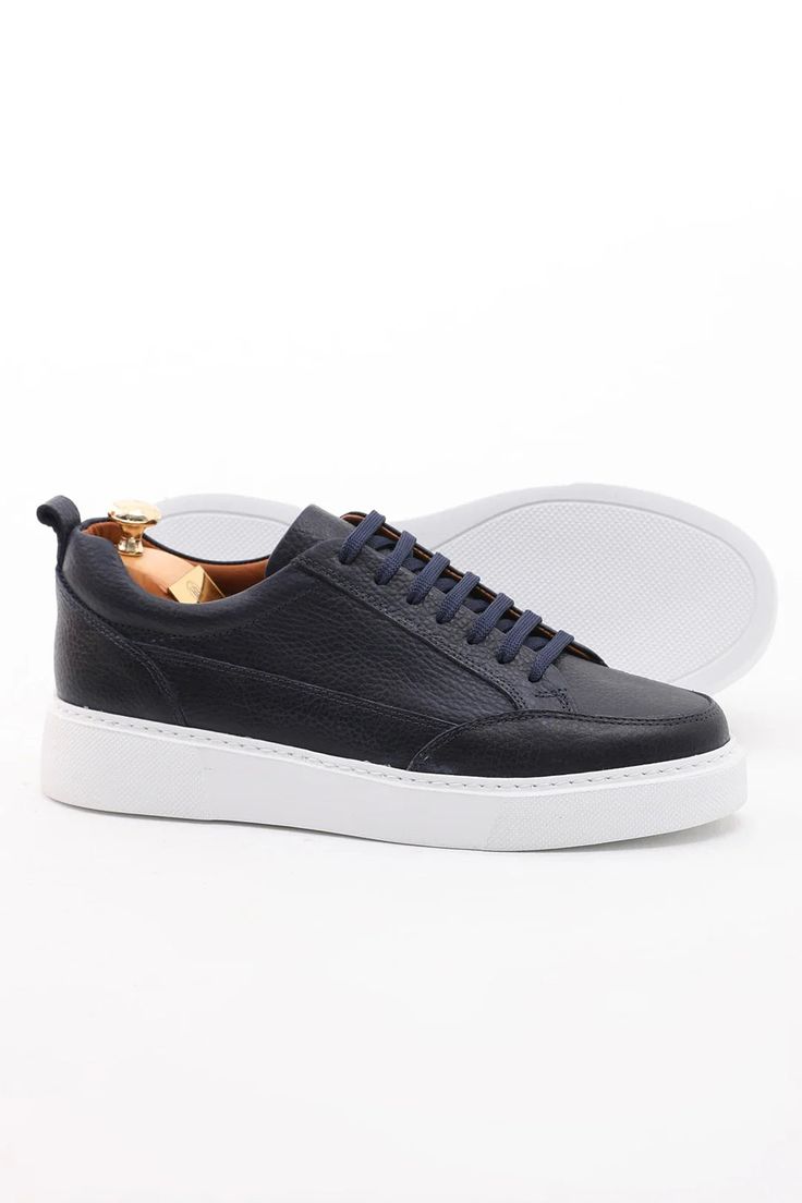 Elevate your casual style with the Azure Coast Leather Sneakers. Handcrafted from premium white floater leather and lined with soft calfskin, these sneakers offer a luxurious feel and unmatched comfort. The lightweight EVA sole ensures a spring in your step, while the versatile design effortlessly complements any casual ensemble. Comfortable Low-top Leather Shoes With Textured Sole, Casual Lace-up Calf Leather Custom Sneakers, Low-top Leather Shoes With Textured White Sole, Casual Custom Sneakers With Perforated Toe Box, Everyday Low-top Leather Shoes With Textured Sole, Casual Low-top Leather Shoes For Everyday, Casual High-top Platform Sneakers In Calf Leather, Sporty Low-top Leather Shoes With Perforated Toe Box, Leather Low-top Slip-on Sneakers