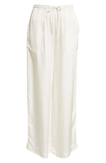 If you must step away from your pool chaise or beach towel, pop on some cotton pants closed with a comfy drawstring. Drawstring waist Front patch pockets 100% cotton Machine wash, line dry Imported White Bottoms With Drawstring And Loosely Fitted Hips, White Drawstring Beach Pants, White Drawstring Bottoms Loosely Fitted Hips, White Drawstring Bottoms For Daywear, White Summer Pants With Tie Waist, Chic White Bottoms With Drawstring, Chic White Drawstring Bottoms, Chic White Drawstring Pants, White Linen Lounging Bottoms