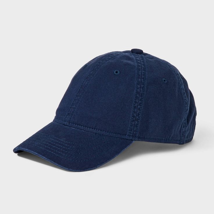 Refresh your warm-weather cap collection with this Cotton Baseball Hat from Goodfellow & Co™. Made from midweight cotton, this textured baseball hat features a curved brim to keep the sun out of your eyes along with embroidered eyelet holes on the head for better ventilation. The back tuck and slide closure completes the design with a customizable fit. Goodfellow & Co™: Where style & fit are always in good company. Classic Cotton Cap, Classic Cotton Hat, Classic Cotton Baseball Cap With Curved Bill, Classic Cotton Baseball Cap With Visor, Classic Cotton Visor Baseball Cap, Casual Navy Baseball Cap For Summer, Classic Cotton Baseball Cap With Curved Brim, Solid Color Cotton Baseball Cap With Curved Brim, Solid Cotton Baseball Cap With Curved Brim