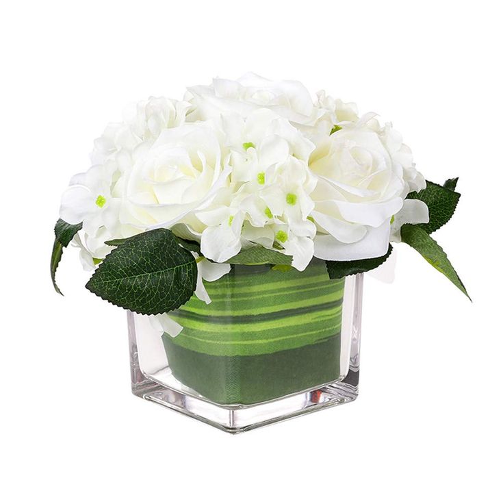 a green vase with white flowers in it on a white background, there is no image here to provide a caption for